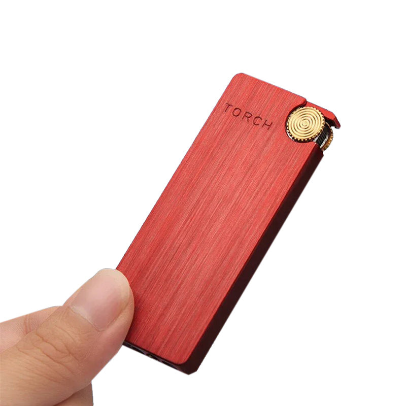 Briquet Original Homme Rouge dans une main