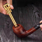 Briquet Pipe tassage de tabac dans une pipe
