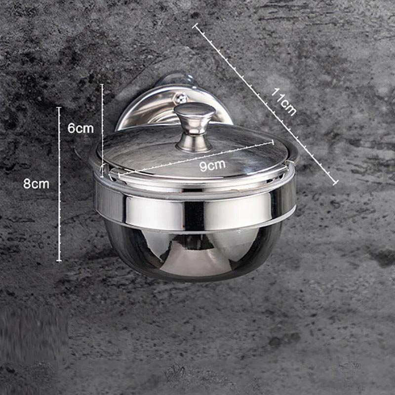 Inox brossé - cendrier mural avec couvercle en position fermée sur mur extérieur
